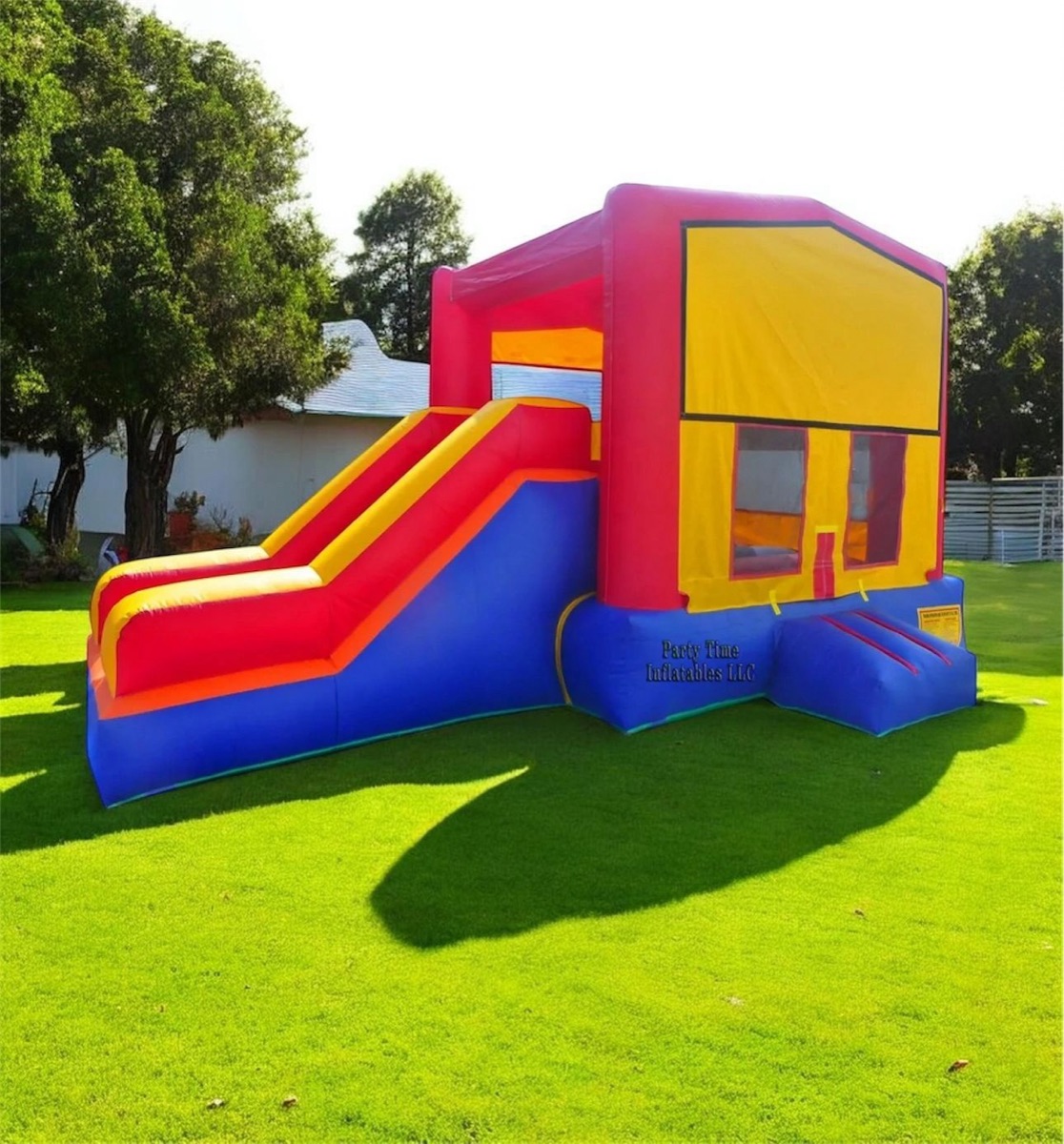 Red, yellow and blue bounce house combo with single lane slide