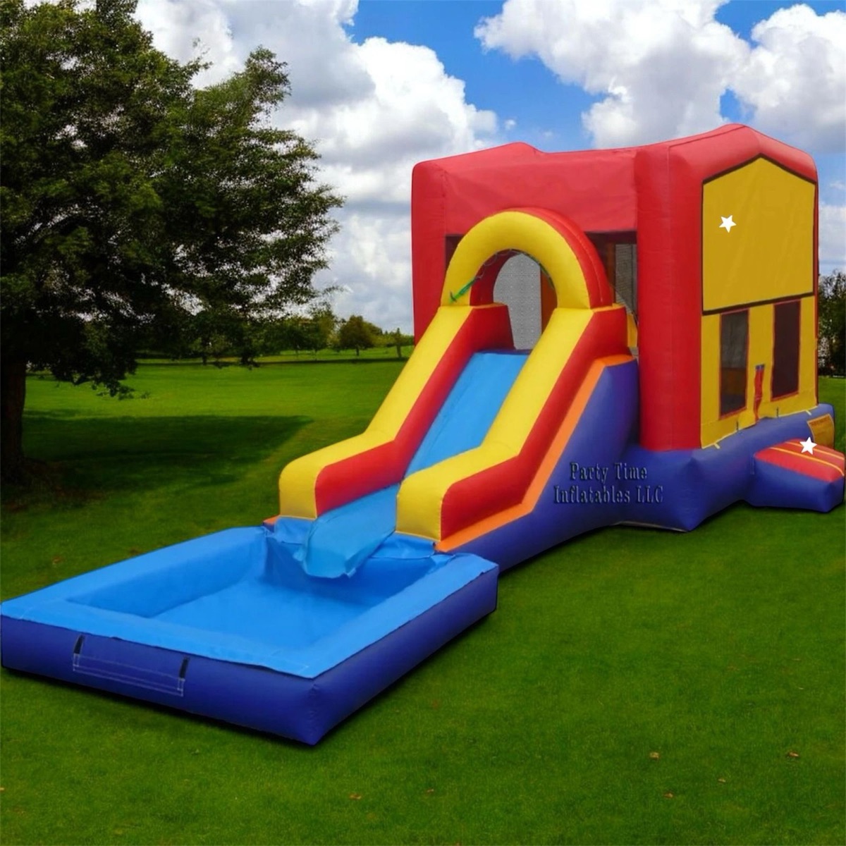4-in-1 single lane bounce house and water slide combo set up on grass
