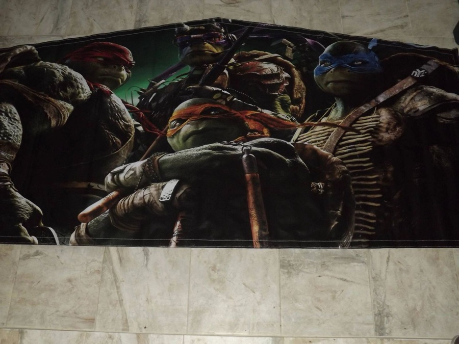 Ninja Turtles bounce house theme banner